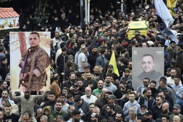 Mourners are seen at the funeral of Ali Ahmed Hussein, commander of Hezbollah’s “Radwan” forces, in Beirut. (AP) 