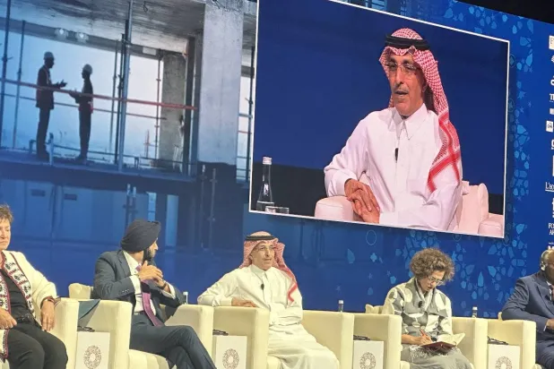 الوزير الجدعان خلال مشاركته في اجتماعات الخريف في مراكش (رويترز)