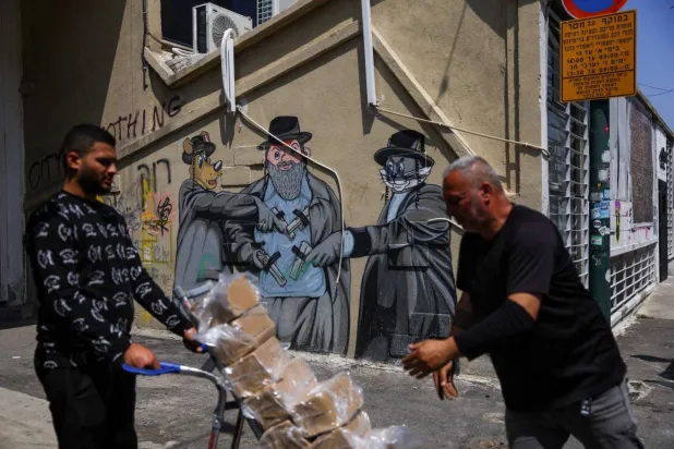 The daily life in Tel Aviv on the day following Iran's launch of drones and missiles towards Israel (Reuters)

