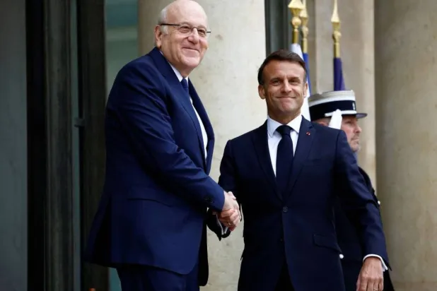 French President Emmanuel Macron receives caretaker Prime Minister Najib Mikati. (Dalati & Nohra)