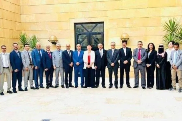 IMF representatives and Yemeni officials at the conclusion of their meetings in Amman