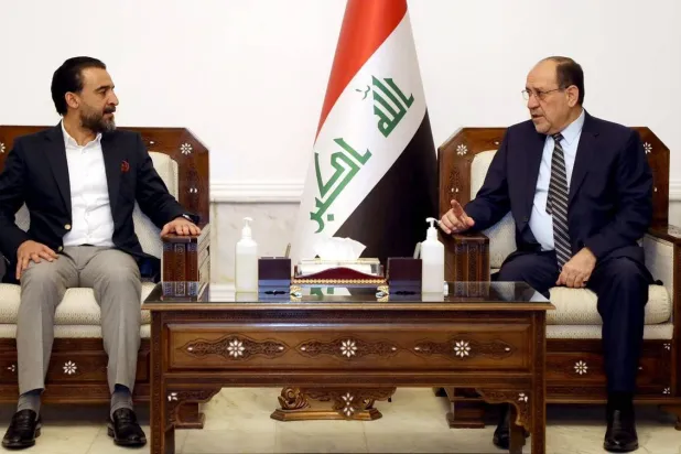 رئيس الوزراء الأسبق نوري المالكي ورئيس البرلمان المقال محمد الحلبوسي (أرشيفية - إعلام المالكي)