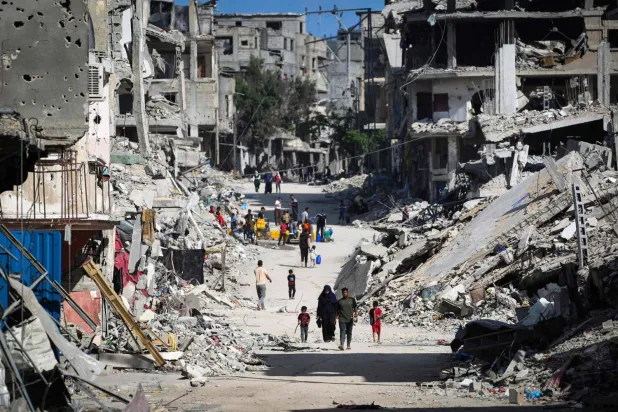 İsrail'in Gazze Şeridi'ne yönelik bombardımanının yol açtığı yıkım (AFP)