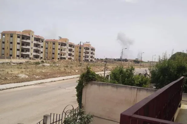 Humus'ta daha önce gerçekleşen bir İsrail bombardımanından (arşiv - Al-Marsad)