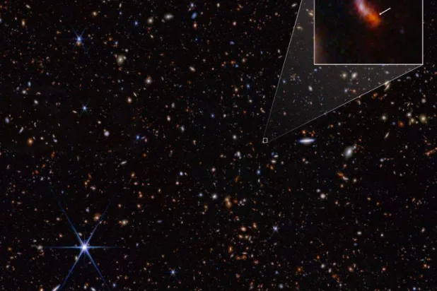 مجرة «JADES-GS-z14-0» تم تحديدها لتكون عند انزياح أحمر قدره 14.32 (+0.08/-0.20) مما يجعلها صاحبة الرقم القياسي الحالي لأكثر المجرات المعروفة نفوراً وهذا يتوافق مع وقت أقل من 300 مليون سنة بعد الانفجار الكبير (أ.ف.ب)