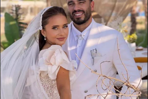 نيللي كريم وهشام عاشور خلال الزفاف (صفحتها على «إنستغرام»)