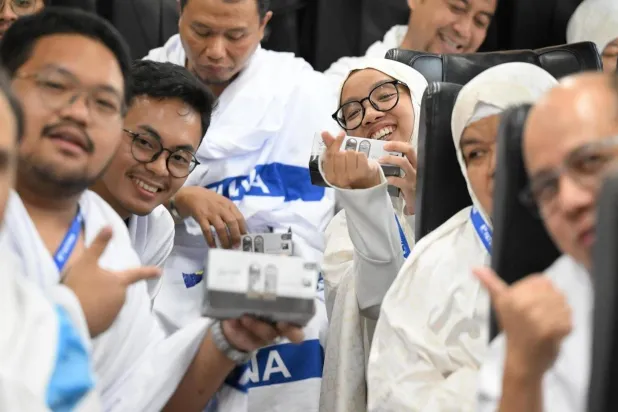 مشاعر السعادة على محيا حجاج بيت الله الحرام تثميناً للترحيب الذي وجدوه في السعودية (واس)