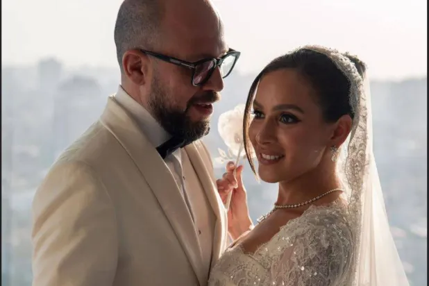 جميلة عوض وأحمد حافظ خلال حفل الزفاف (إنستغرام)