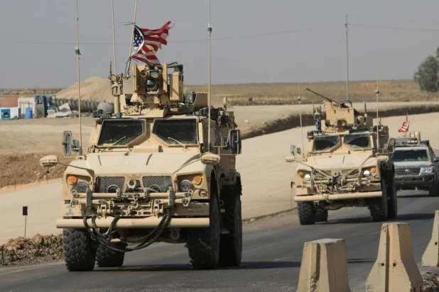 An American military convoy is seen near the Syrian-Iraqi border. (Reuters file photo)
