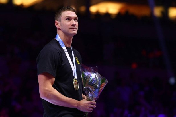 Ryan Murphy of the United States reacts during the Men's 100m backstroke medal ceremony on Day Three of the 2024 US Olympic Team Swimming Trials at Lucas Oil Stadium on June 17, 2024 in Indianapolis, Indiana. (Getty Images/AFP) 