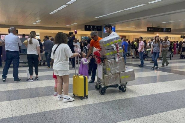 People are seen at the arrival lounge at Beirut International Airport, Lebanon. (Asharq Al-Awsat) 