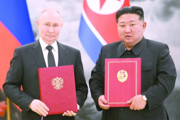 Putin ve Kim dün Kapsamlı Stratejik Ortaklık Anlaşması’nın imza törenine katıldılar (Reuters)