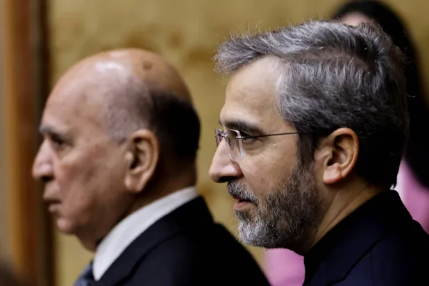 Iran's acting foreign minister Ali Bagheri Kani and Iraqi Foreign Minister Fuad Hussein arrive for a joint news conference in Baghdad, Iraq June 13, 2024. REUTERS/Thaier Al-Sudani