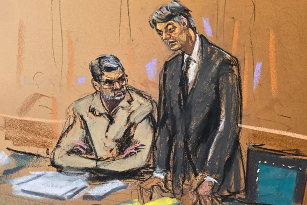 يقف محامي الدفاع ريناتو ستابيلي ليدافع عن رئيس هندوراس السابق في المحكمة الفيدرالية في حي مانهاتن بمدينة نيويورك (رويترز)