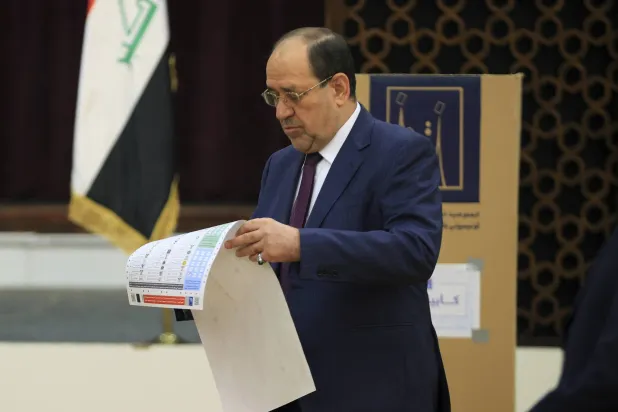  المالكي خلال مشاركته في الانتخابات المحلية ديسمبر الماضي (أ.ب)