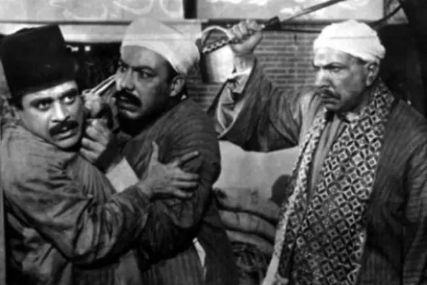 زكي رستم وفريد شوقي وتوفيق الدقن في فيلم «الفتوة» (أرشيفية)

