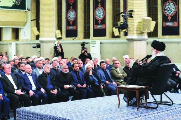 
صورة نشرها موقع المرشد الإيراني علي خامنئي خلال استقباله نواب البرلمان الجديد أمس