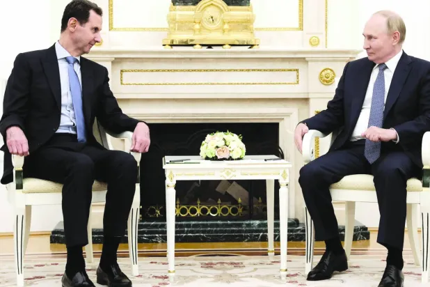 Rusya Devlet Başkanı Vladimir Putin, planlanmamış bir ziyarette Suriye Devlet Başkanı ile görüştü (AFP)