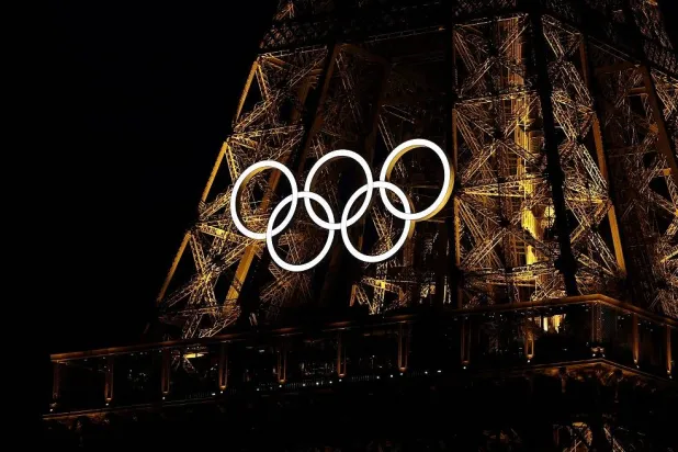 A general view of the Olympic rings on the Eiffel Tower a day before the opening ceremony of the Paris 2024 Olympics, in Paris, France June 25, 2024. (Reuters)