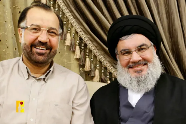 Hizbullah Genel Sekreteri Hasan Nasrallah ve Beyrut'un güney banliyösünde İsrail tarafından öldürülen Hizbullah'ın üst düzey komutanı Fuad Şükür (AFP)