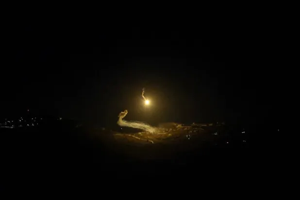 The Israeli army fires a flare over the border with Lebanon, in the upper Galilee, northern Israel, early 04 August 2024. (EPA)