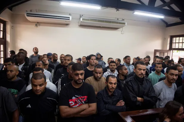 عدد من الليبيين الذين اعتقلتهم سلطات جنوب أفريقيا (رويترز)