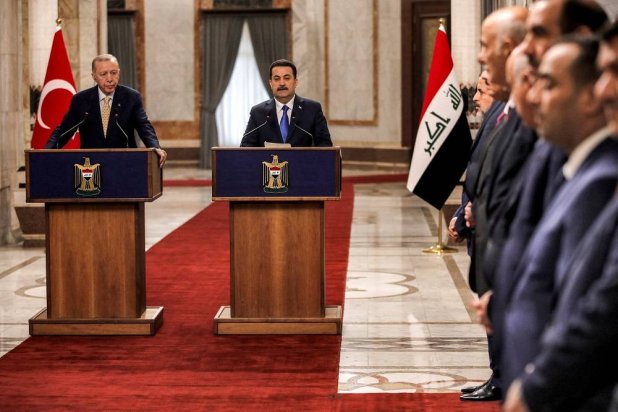 Iraq's Prime Minister Mohammed Shia al-Sudani (R) and President Recep Tayyip Erdoğan give a joint statement to the media in Baghdad, Iraq, April 22, 2024. (Reuters)