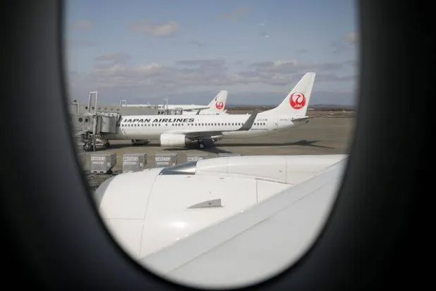 طائرة بمطار نيو شيتوسي الياباني (رويترز)