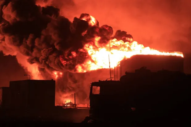 The Israeli strikes destroyed 29 of the 41 oil storage tanks at Hodeida port (AFP)
