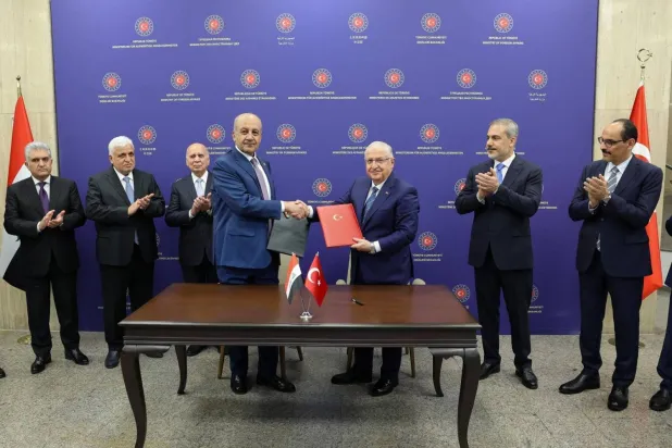 Turkish and Iraqi defense ministers signed a memorandum of understanding to combat terrorism in Ankara on Aug. 15 (Turkish Foreign Ministry)