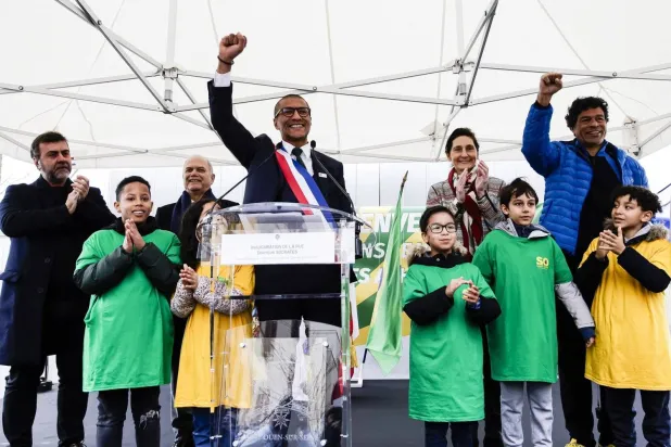 Karim Bouamrane delivering a speech at the opening of “Socrates Street” in the Olympic Village, March 2024 (Getty)