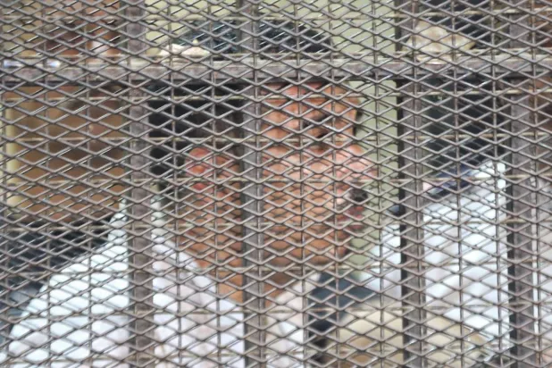 المتهم داخل القفص خلال جلسة سابقة لمحاكمته (الشرق الأوسط)