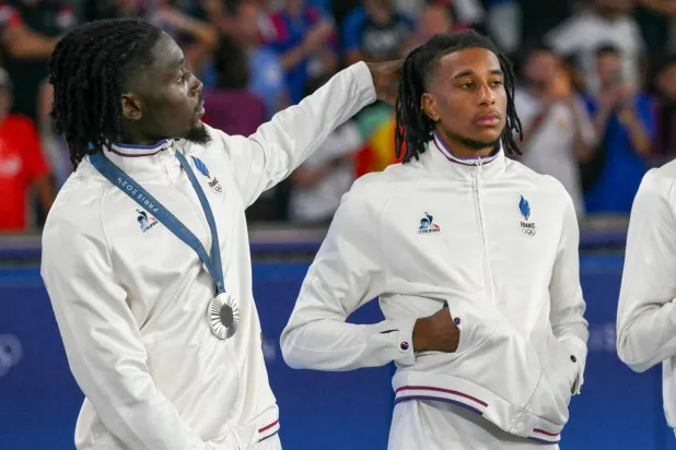 ميكايل أوليسيه ومانو كونيه (أ.ف.ب)