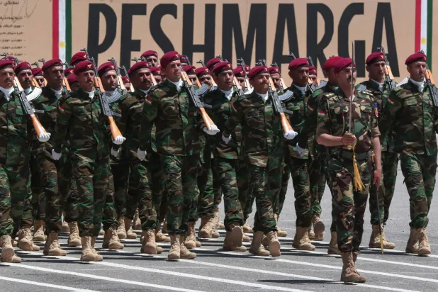 قوات من البيشمركة الكردية خلال احتفال في أربيل عاصمة إقليم كردستان 22 يونيو 2023 (أ.ف.ب)