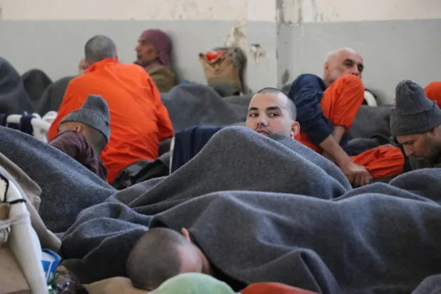 ISIS prisoners are seen at a jail in Raqqa, Syria. (Asharq Al-Awsat)
