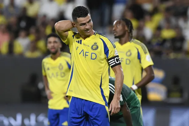 Cristiano Ronaldo, Al Nassr'ın AFC Şampiyonlar Ligi'ndeki açılış maçını kaçıracak. (Reuters)