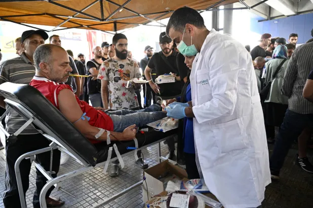 ما حدث في لبنان كان بمثابة اختبار لقدرة القطاع الصحي على التعامل مع الوضع في حالة حدوث حرب أوسع نطاقاً مع إسرائيل (إ.ب.أ)