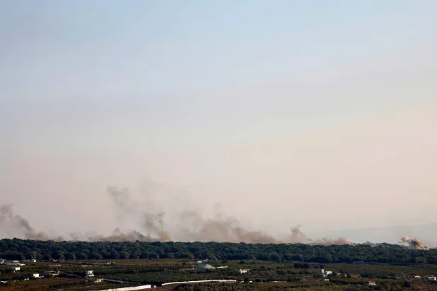 الدخان يتصاعد من هضبة الجولان السوري المحتلة أغسطس الماضي (أ.ف.ب)