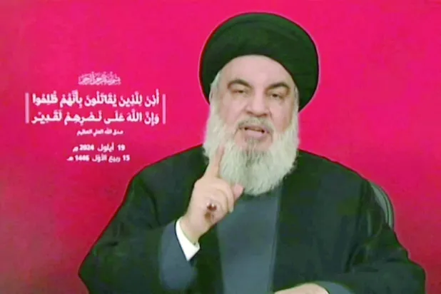Nasrallah said in his first televised appearance after this week's electronic devices' attacks in Lebanon that Israel had dealt an "unprecedented" blow to his group, crossing all red lines with device explosions that killed 37 people and wounded nearly 3,000 over two days. (Photo by Al-Manar / AFP)  