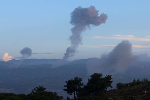 Smoke billows over southern Lebanon following Israeli strikes, amid ongoing cross-border hostilities between Hezbollah and Israeli forces, as pictured from Marjeyoun, near the border with Israel, September 23, 2024. (Reuters)