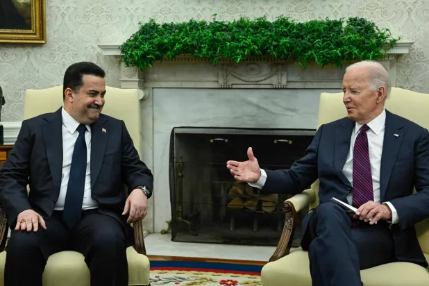 رئيس الحكومة العراقية محمد شياع السوداني مع الرئيس الأميركي جو بايدن في واشنطن (أرشيفية - أ.ف.ب)