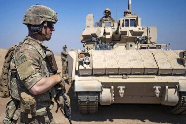  US soldiers are seen during a joint military exercise between US-led forces and members of the Syrian Democratic Forces (SDF) in Syria's northeastern Hasakah province on September 7, 2022. (AFP) 