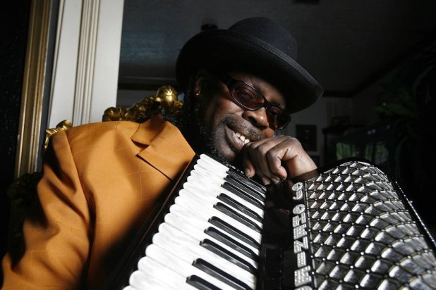 Son of the Zydeco King Clifton Chenier, C.J. Chenier holds his father's accordion in Houston, May 29, 2006. (Ben Desoto/Houston Chronicle via AP, File) 