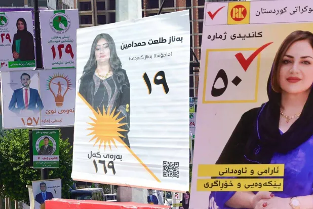 لوحات إعلانية لمرشحات ومرشحين كرد في أحد شوارع أربيل (روداو)