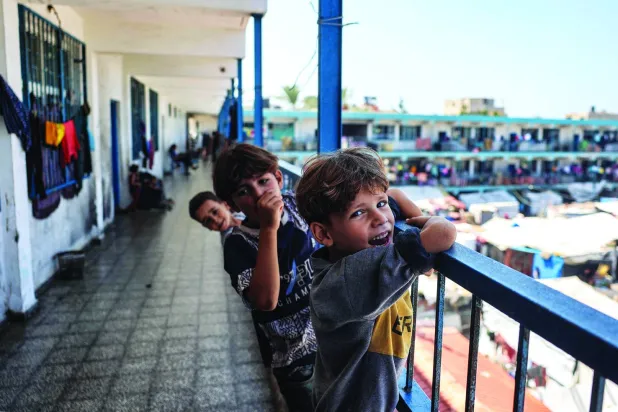 أرشيفية أطفال بمركز لـ«الأونروا» في دير البلح بغزة (أ.ف.ب)