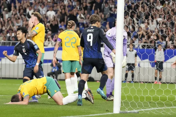 اليابان أدركت التعادل بهدف عكسي في الشباك الأسترالية (أ.ب)