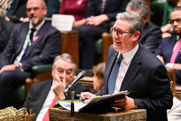 A handout photograph released by the UK Parliament shows Britain's Prime Minister Keir Starmer speaking during the weekly session of Prime Minister's Questions (PMQs) at the House of Commons, in London, on October 16, 2024. (UK Parliament/ AFP)