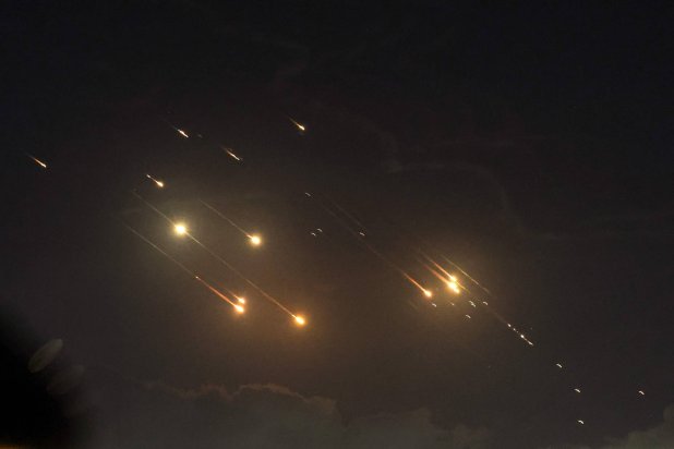This picture shows projectiles being intercepted by Israel near the northern city of Baqa al-Gharbiya on October 1, 2024. (Photo by Ahmad GHARABLI / AFP)