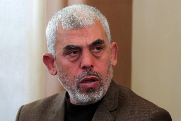 (FILES) Yahya Sinwar attends the opening of a new mosque in Rafah town in the southern Gaza Strip on February 24, 2017. (Photo by SAID KHATIB / AFP)