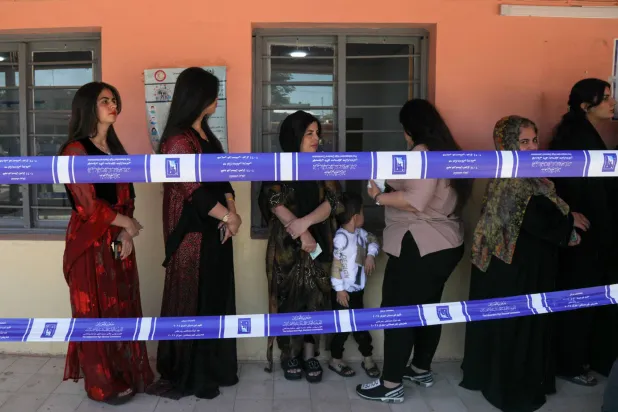 ناخبون كرديون يُدلون بأصواتهم في سادس انتخابات تشريعية بكردستان العراق (أ.ف.ب)